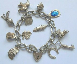 Vintage Solid Silver Charm Bracelet 12 Charms