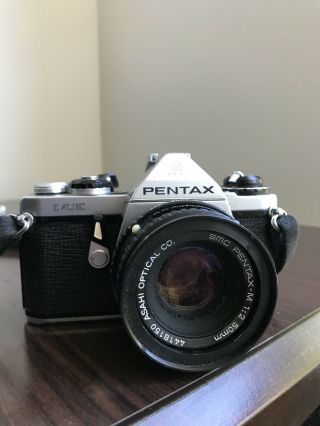 Vintage Pentax Me 35mm Slr Camera With Smc Pentaxm 1:2 50mm Lens