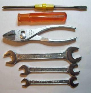 Vintage Tool Kit,  Toyota 6  Pliers,  3 Toyota Motor Wrenches,  Flip Screwdriver