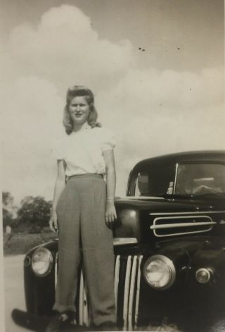 Vintage Found Photograph Of A Pretty Blonde Young Woman Posing In Front Of A Car