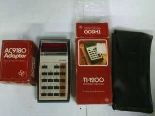 Vintage Texas Instruments Ti - 1200 Calculator,  Box W/ Charger.