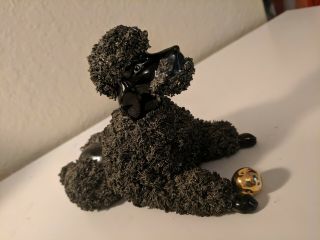 Vintage Black Spaghetti Poodle Laying Down W/ Gold Ball & Tag Dog Figurine Japan