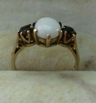 A 9 Ct Gold Vintage 3 Stone Garnet Ring.  Hall Marked.
