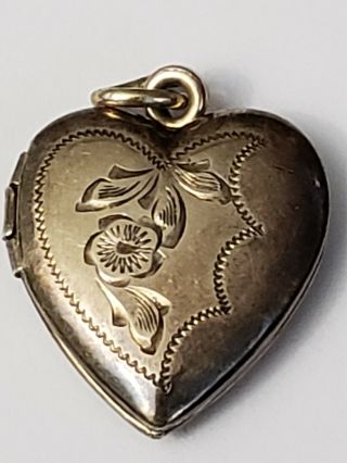 Stamped.  925 Sterling Silver Gold Filled Heart Locket Weighs 3.  5 Grams Vintage