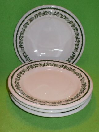 Set Of 4 Vintage Buffalo China 7 1/8 " Plates With Green Flower Border On White.