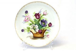 Vintage White Porcelain Plate With A Gold Gild And Flower Basket Design