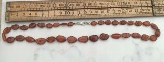 A Vintage Or Modern Amber Bead Necklace With Silver Clasp