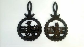 Set Of 2 Vintage Cast Iron Metal Footed Trivets Hot Plates Man/woman