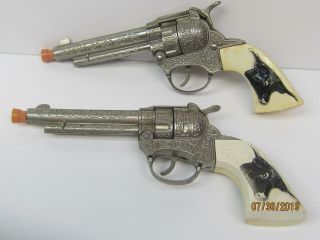 VINTAGE HUBLEY TEXAN JR.  PISTOLS WITH DOUBLE HOLSTER, 7