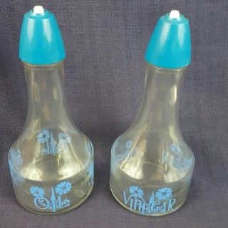 Vintage Gemco Oil And Vinegar Cruets Bottles.  Clear With Blue Lids And Designs