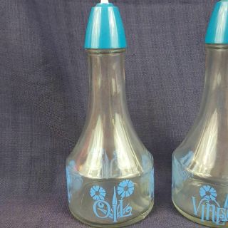 Vintage Gemco Oil And Vinegar Cruets Bottles.  Clear With Blue Lids and Designs 2