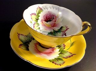 Vintage Scalloped Cup And Saucer.  Yellow With Red Roses And Gold Accents