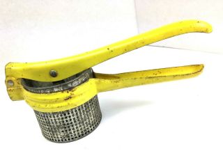 Vintage Yellow Handle Juicer / Potato Masher / Strainer / Ricer Metal