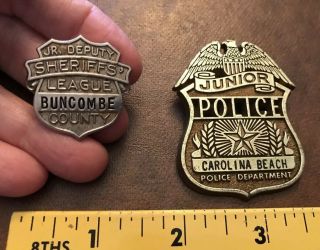 2 Vintage Toy Badges: Jr Deputy Sheriff Buncombe County,  Police Carolina Beach
