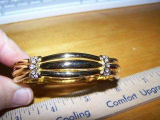 Vintage Nolan Miller Gold Tone Rhinestone Bows Hinged Bangle Bracelet