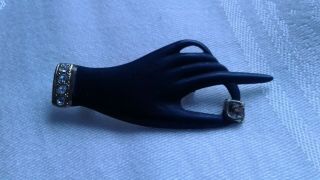 A Vintage Gold Tone Black Enamel Clear White Rhinestones Hand Brooch