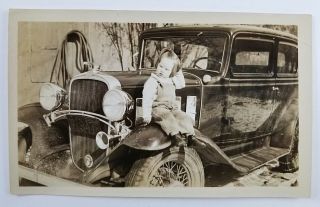 Vintage Snapshot Photograph Little Girl Sitting On Car Fender Reflection 1932