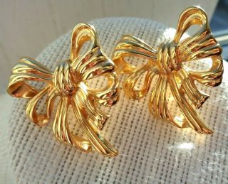 VINTAGE SIGNED GIVENCHY POLISHED GOLDEN RIBBON BOW DESIGN PIERCED EARRINGS 2