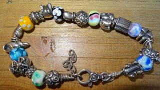 A Vintage Hallmarked Silver Bead And Charm Bracelet
