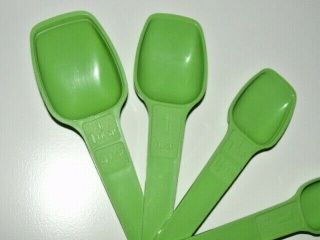 VTG TUPPERWARE Measuring Spoons SET OF 7 GREEN 1/8,  1/4,  1/2,  1& 1 1/2t,  1T,  1T,  4t 4