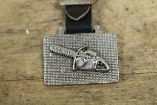 Antique Vintage Watch Fob - Homelite Chainsaw 57