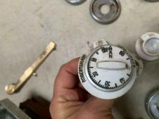 Vintage Stove Clock and Knobs all sorts.  Off of 1950 ' s Wedgewood Stove 8
