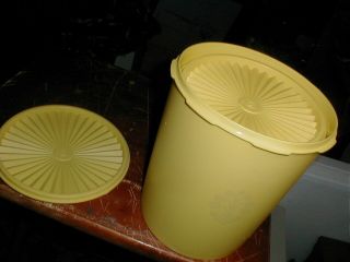 Set Of 4 Vintage Tupperware Yellow Starburst Servalier Canisters.
