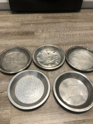 5 - Vintage Pie Pans Tin Plates 9” (2 Martino’s,  2 Bakers Square,  1 Bowie)