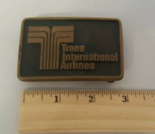 Vintage Trans International Airlines Belt Buckle Aviation