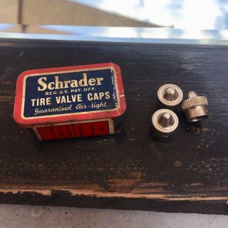 Vintage Schrader Tire Valve Caps In Tin