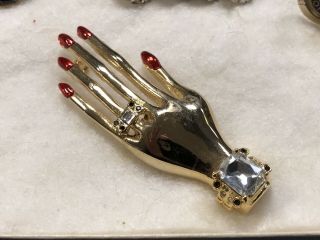 Vintage Gold Tone Hand Pin Brooch Long Red Nails Clear Rhinestone Manicure