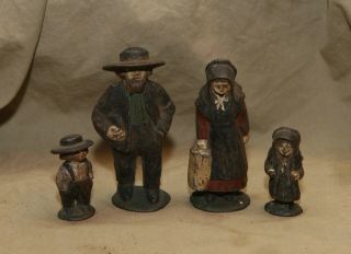 4 Vintage Antique Painted Cast Iron Amish Family Paperweights Toy Figurines