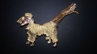 Vintage Dog Brooch Gold Tone W/ Rhinestone Pink Eyes W/ Dangling Chain For Tail