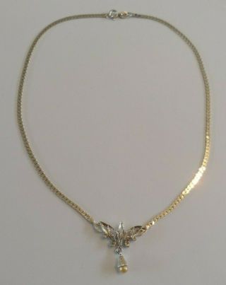 Vintage Silver Necklace With A Dainty Simulated Pearl And Diamante Drop.