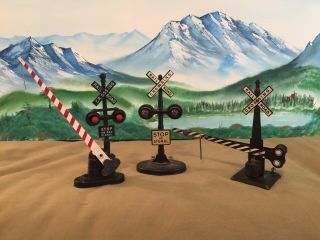 Vintage Lionel & Marx Railroad Crossing Signals And Gates.  Set Of 3