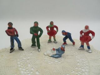 Group Of Five Vintage Barclay Lead Skaters And One Tobogganer