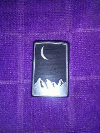 Zippo Vintage.  Moon And Mountains In Harley Case