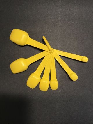 Vintage Tupperware Yellow measuring spoons complete set collectible 2