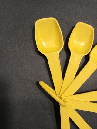 Vintage Tupperware Yellow measuring spoons complete set collectible 3