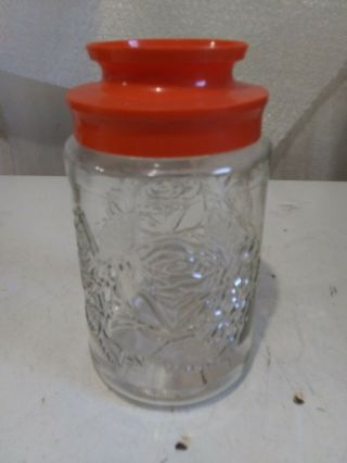 Vintage Anchor Hocking Glass Jar With Orange Lid Embossed Roses