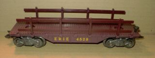 Vintage Marx O Gauge Trains.  " Erie Flatcar W/ Side Rails 4528 "