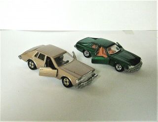 2 Tomica Vintage Pocket Cars,  A Cadillac Seville & Jaguar Xj 1978 Made In Japan