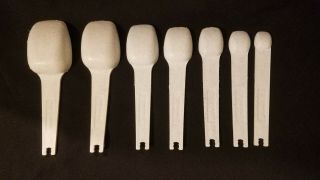 Vintage Tupperware Orange Measuring Spoons Complete Set of 7 VG 2