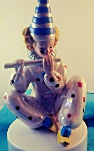 Vintage Musical Revolving Clown Figurine Playing The Flute Irridescent Paint