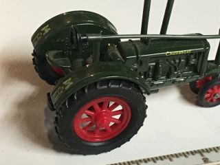 Massey Harris markedF - 2 Vintage Challenger toy tractor 1/64,  very 3
