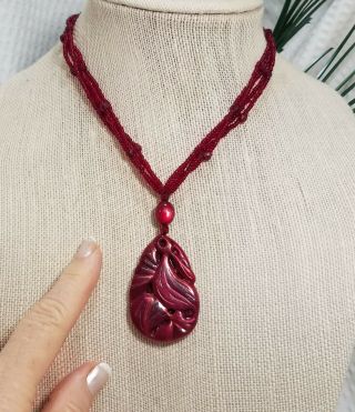 Vintage Red Carved Swirled Resin Teardrop Pendant And Red Seed Bead Multi Strand