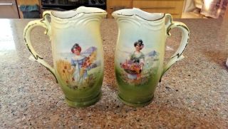 Vtg Set Of 2 Green Porcelain Creamers Czechoslovakia Women Gathering Flowers