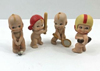 4 Vintage Lefton Kewpie Ceramic Babies Golf Football Baseball Tennis Sports