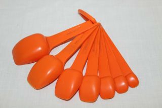 Vintage orange Tupperware measuring spoons set of 7 2