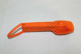 Vintage orange Tupperware measuring spoons set of 7 3